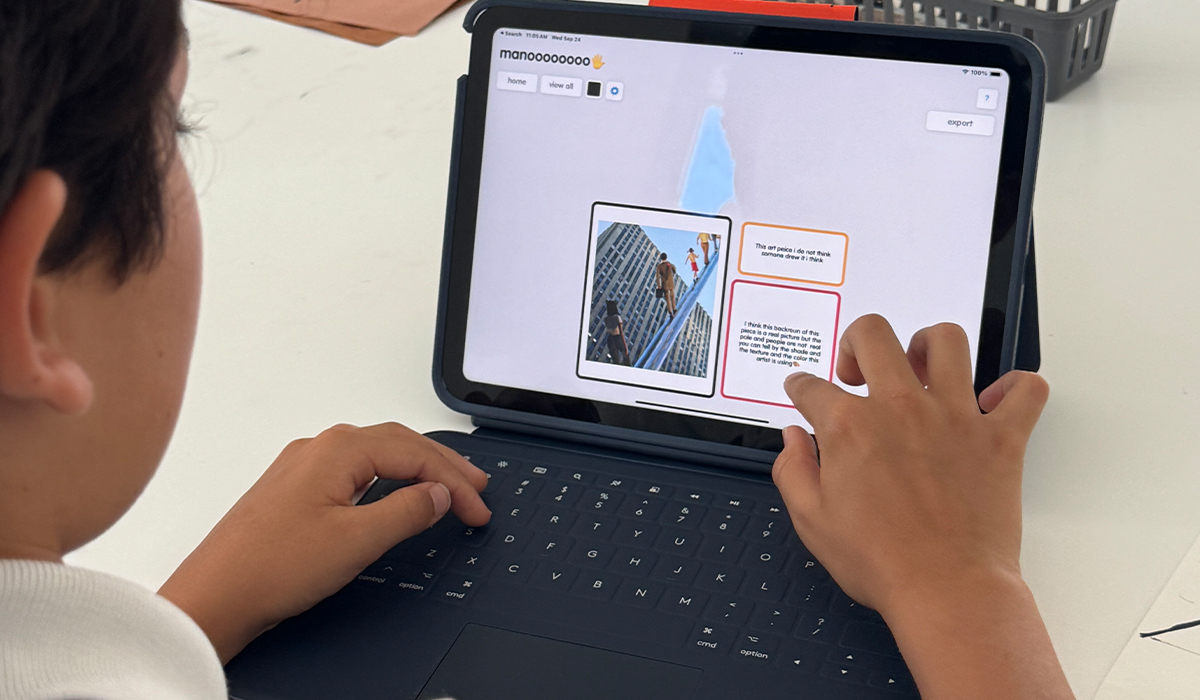 Student creating a digital book on an iPad