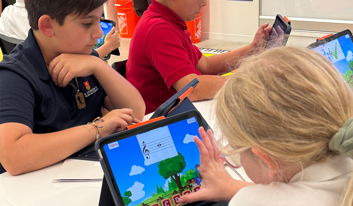 Students using iPads in class